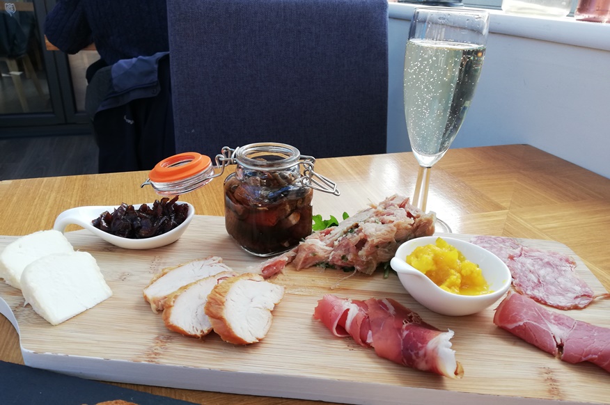 Local food platter and sparkling wine